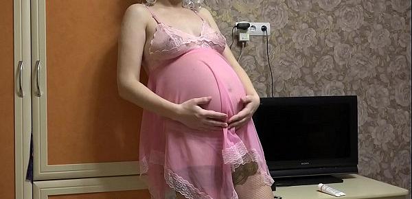  Pregnant milf fucks with dildo through panties and shakes natural tits.
